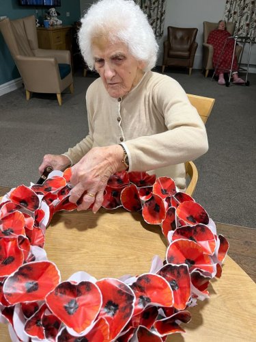 Carousel post from Hollins Park Care Home.