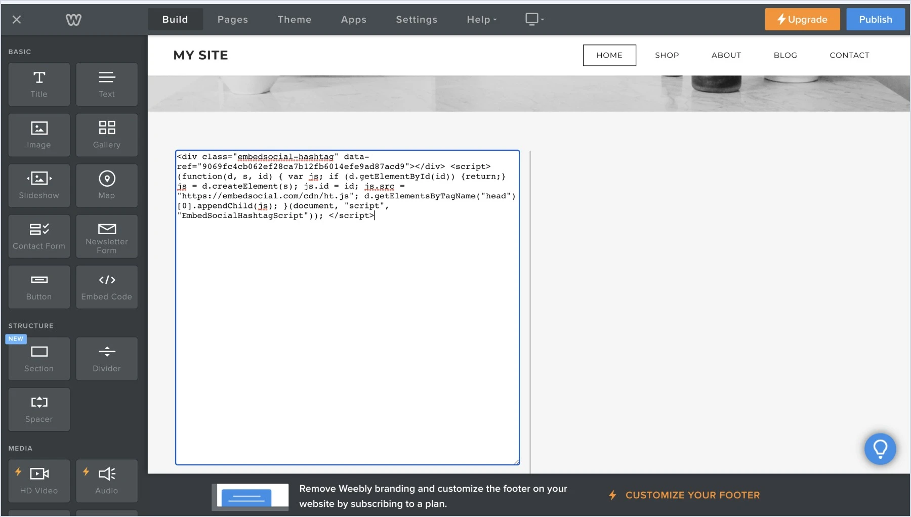 Pasting the widget code on the Weebly editor