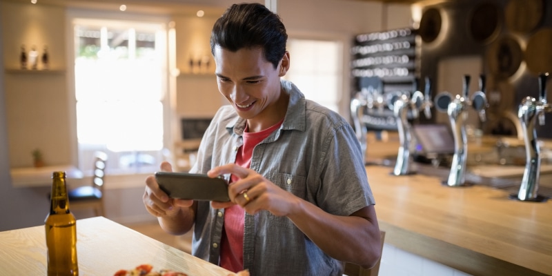 customer taking food photo