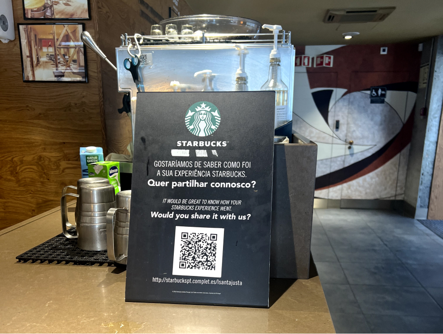 Starbucks collects Google reviews with printed QR codes on flyers